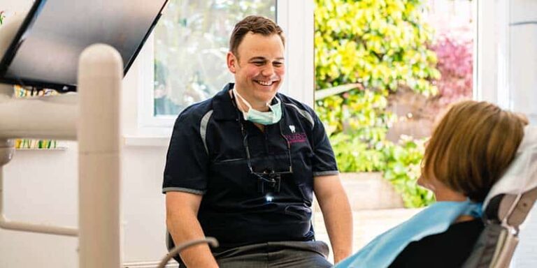 Dentist having consultation with new patient