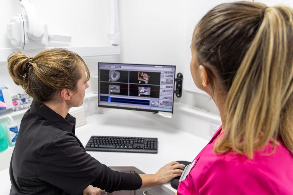 Pure Dental Implants Looking At Scans