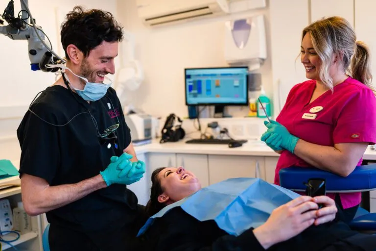 Pure Dental Interacting With Patient