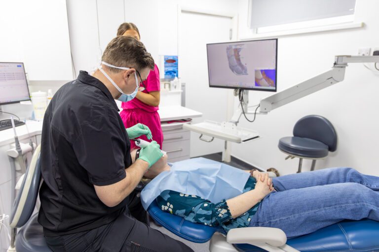 Pure Dental Scanning Patients Teeth