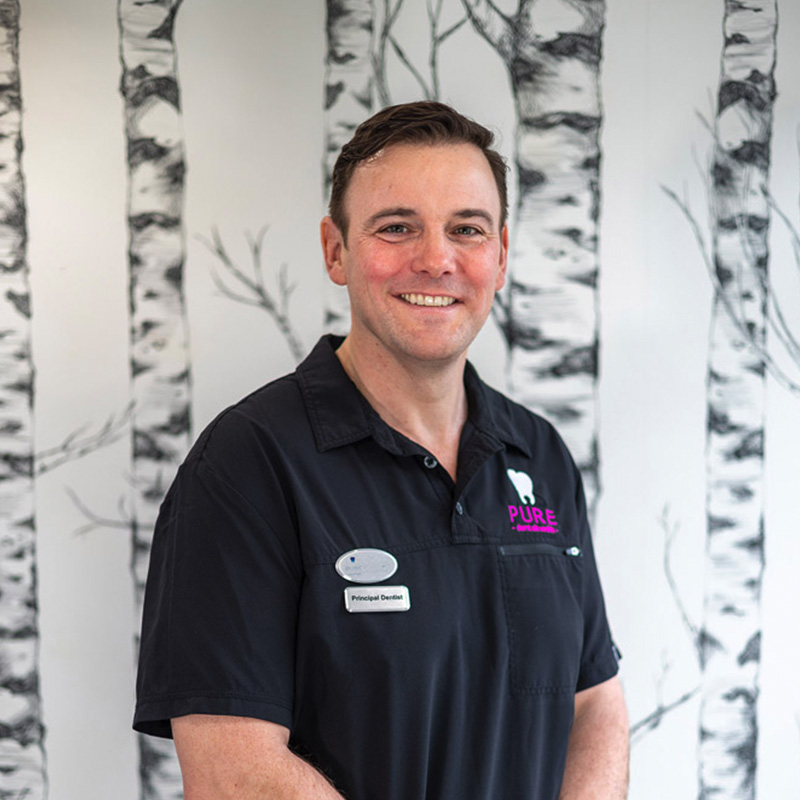 A headshot of dentist Mark Durnall at Pure Dental.