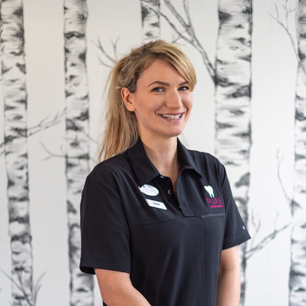 A headshot of dentist Martyna at Pure Dental.