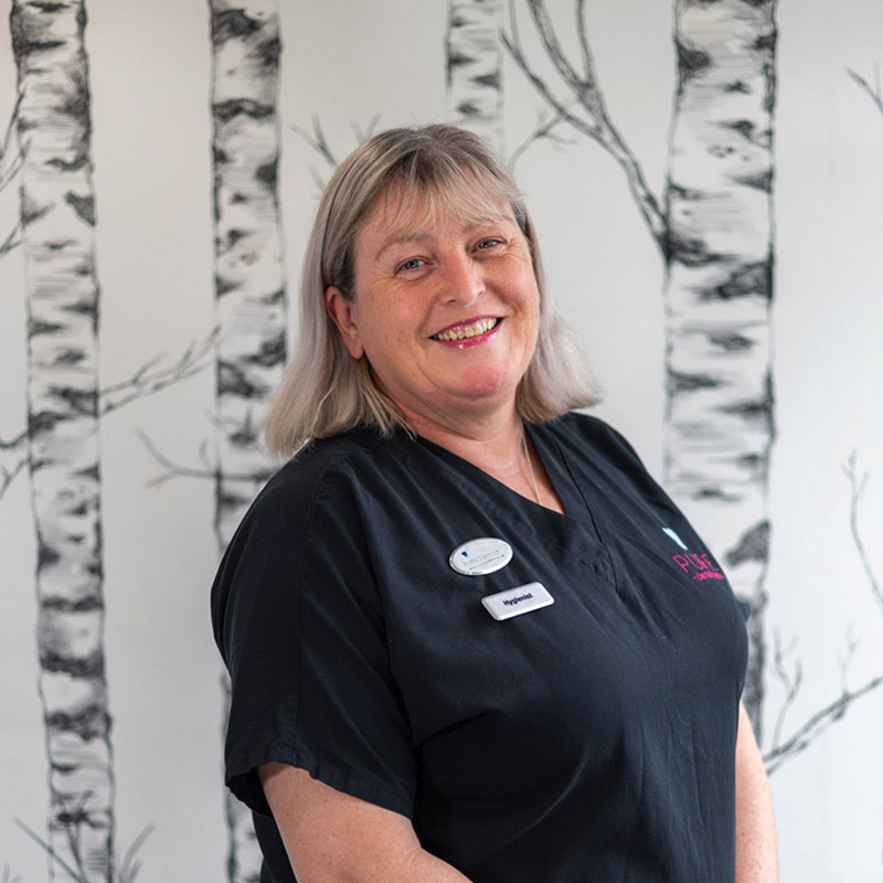 A headshot of dental hygienist Nicola Shepherd at Pure Dental.
